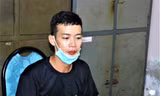 Nghi phạm Lý Văn Phương tại cơ quan công an