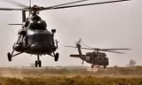 Trực thăng Mi-17 (trái) của không quân Iraq