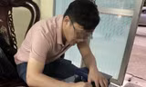 Nam tài xế T. làm việc với lực lượng chức năng.