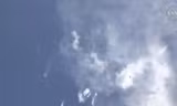 Hình ảnh tên lửa SpaceX Falcon 9 màu trắng vỡ tan thành từng mảnh. (Nguồn: NASA TV)