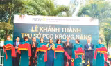 Lãnh đạo UBND huyện Krông Năng cùng các đại biểu cắt băng khánh thành trụ sở PGD BIDV Krông Năng