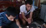 Đối tượng Nguyễn Văn Đô (áo trắng). Ảnh CA cung cấp.