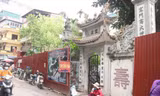 Đình Hoàng Cầu trong quá trình tu bổ Ảnh: KỲ SƠN 