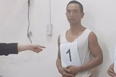 Lê Hồng Phong lúc bị bắt. Ảnh: C.A.