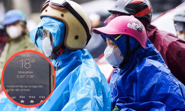 Người Hà Nội co ro trong mưa lạnh 18°C sáng đầu tuần