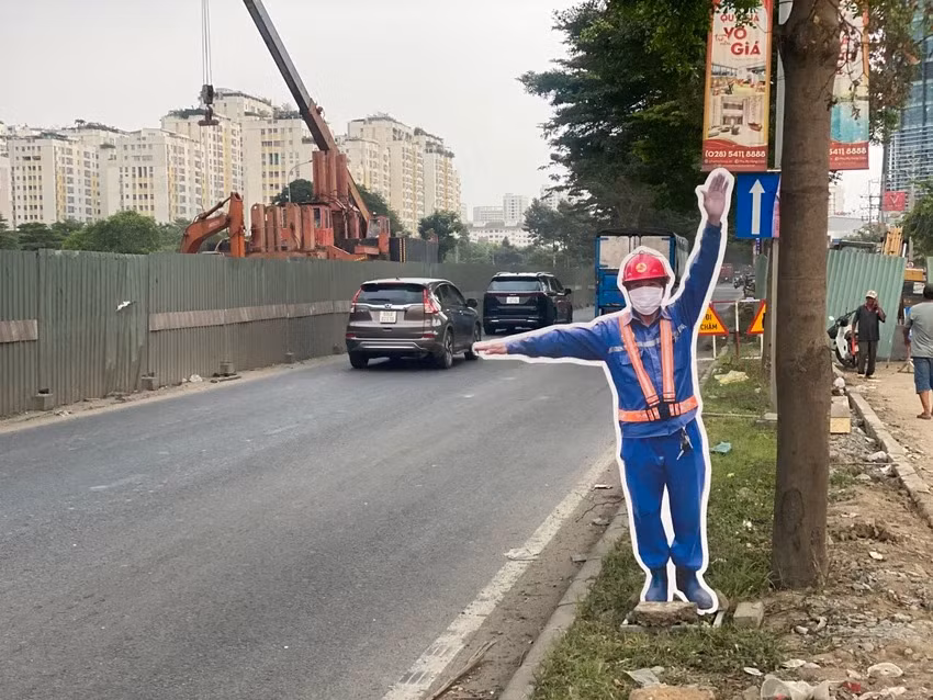 Một mô hình chỉ dẫn người tham gia giao thông di chuyển qua khu vực dự án. Một mô hình chỉ dẫn người tham gia giao thông di chuyển qua khu vực dự án.
