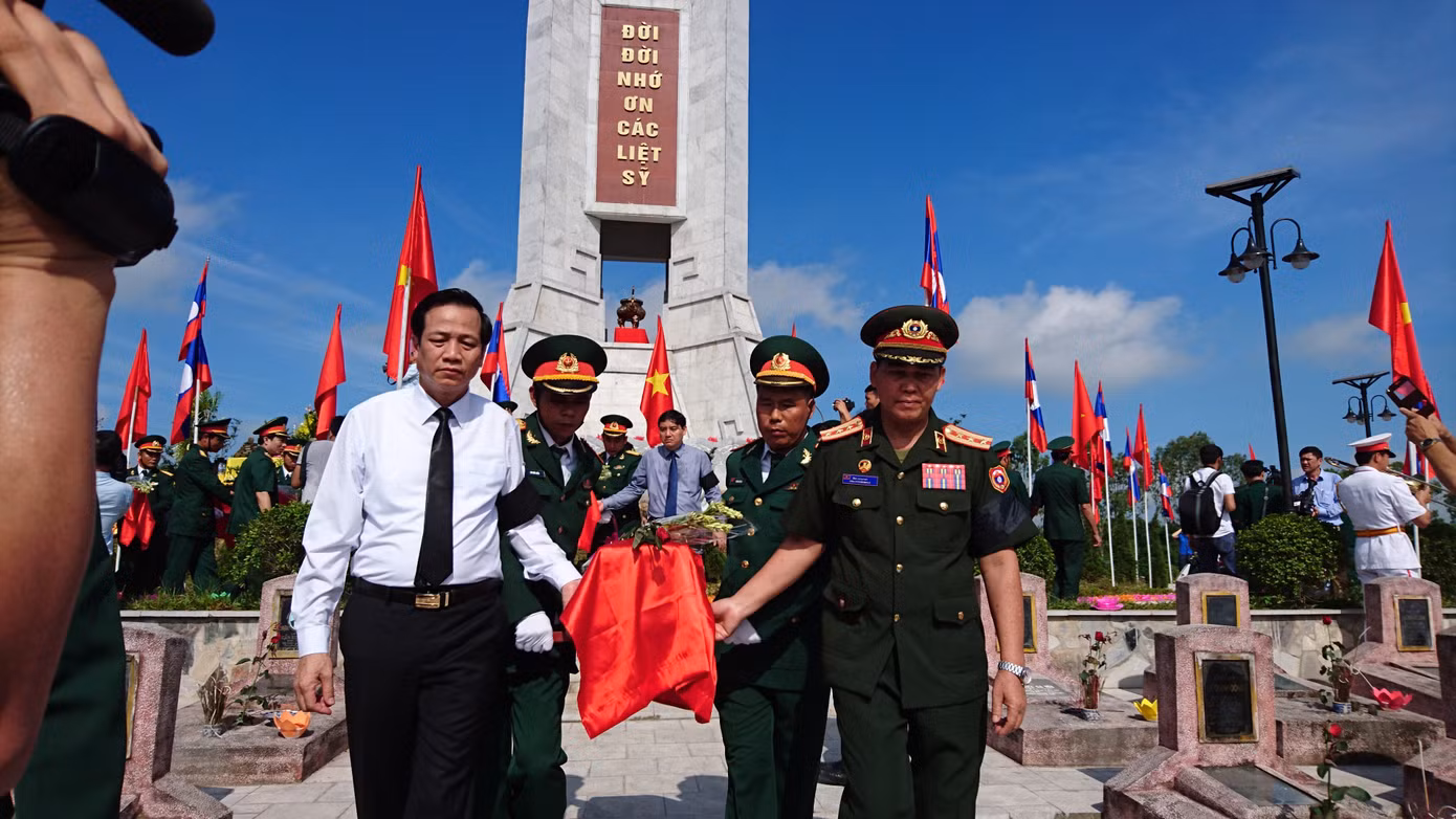 Đưa 104 liệt sĩ về với đất mẹ ảnh 10