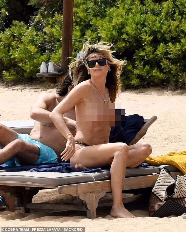 Trong lúc tắm nắng, Heidi không hề e ngại nơi công cộng mà cởi áo bikini lộ ngực trần. Hình ảnh này gây tranh cãi trên mạng xã hội. Đa số ý kiến cho rằng khỏa thân trên bãi biển không hề xa lạ ở các nước phương Tây, tuy nhiên hành động của Heidi phản cảm vì buổi đi chơi còn có bạn trai của con gái. Cư dân mạng bình luận: "Văn hóa Mỹ và châu Âu khác nhau. Với một số nước châu Âu như Italy, Pháp hay Tây Ban Nha, khỏa thân nơi công cộng không phải vấn đề. Điều kỳ lạ ở đây là có cả bạn trai của Leni", "Tôi nghĩ bất kỳ người châu Âu bình thường nào (khôn ngoan về đạo đức) đều thấy lộ ngực trần trước mặt bạn trai của con gái thật đáng sợ. Đây là phép lịch sự cơ bản", "Tôi không bao giờ có thể làm điều này khi con gái tôi và chồng con bé ở đó. Không hề thích hợp", "Khỏa thân rất phổ biến ở người Pháp, người Đức... Nhưng tôi đồng ý rằng làm điều đó trước mặt bạn trai của con gái đó là cực kỳ không phù hợp"...
