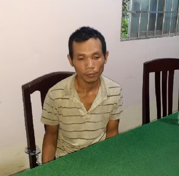 Đối tượng Thân Văn Khối tại cơ quan công an. Ảnh: CAHG