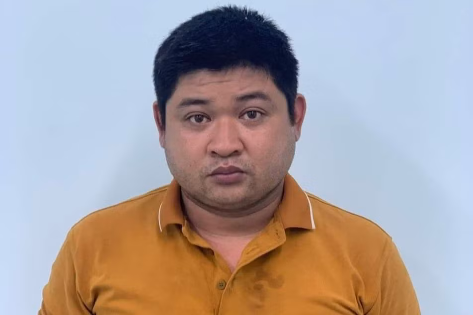 Trần Thanh Bình tại cơ quan công an. Ảnh: Công an cung cấp.