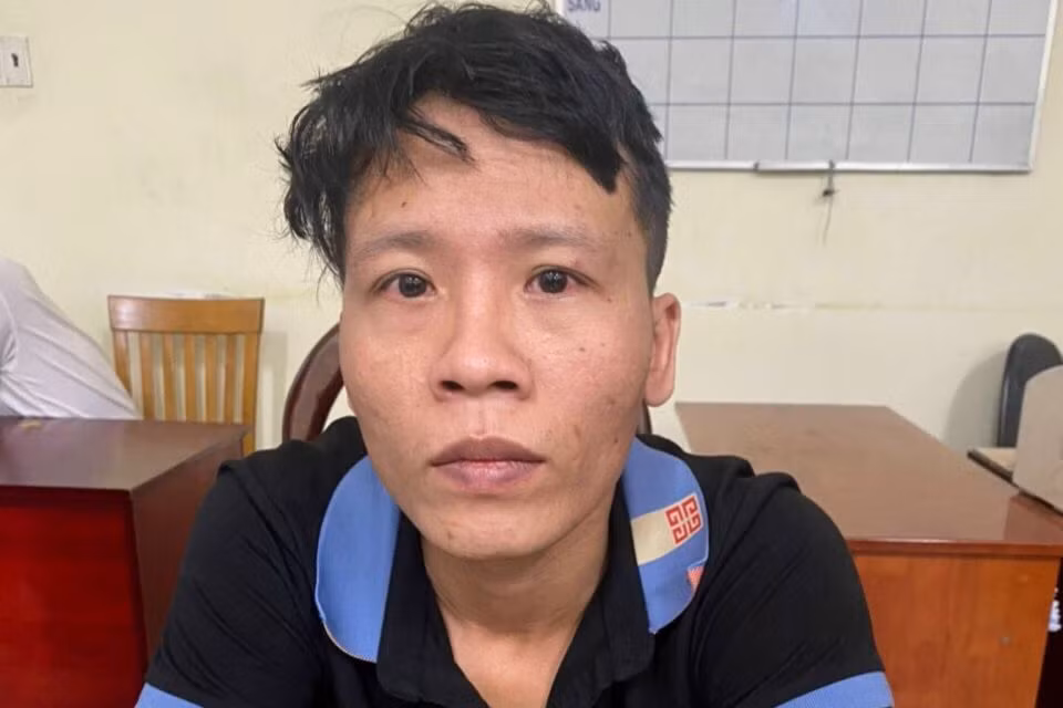 Lê Đình Tuấn lúc bị bắt giữ. Ảnh: N.T.