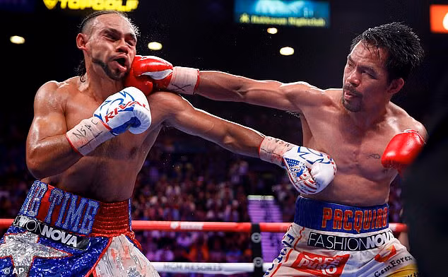 Pacquiao hạ tay đấm kém 10 tuổi, giành đai WBA hạng bán trung ảnh 4