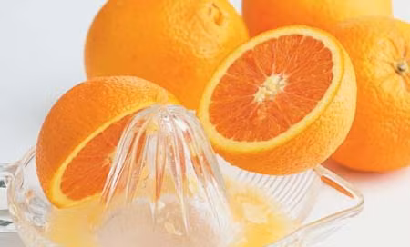 Vitamin C trong cam giúp tóc nhanh dài
