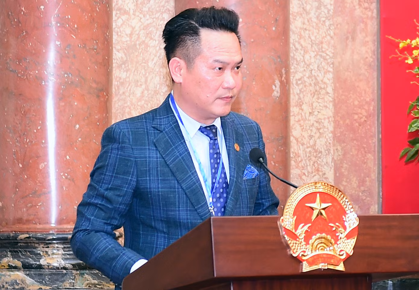 Anh Đặng Hồng Anh báo cáo tại chương trình. Ảnh: Xuân Tùng