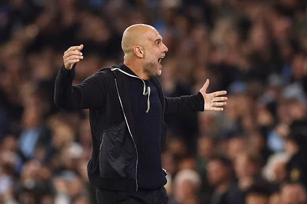Niềm vui chiến thắng không thể xoa dịu sự thất vọng của HLV Guardiola. Ảnh: Getty Images.