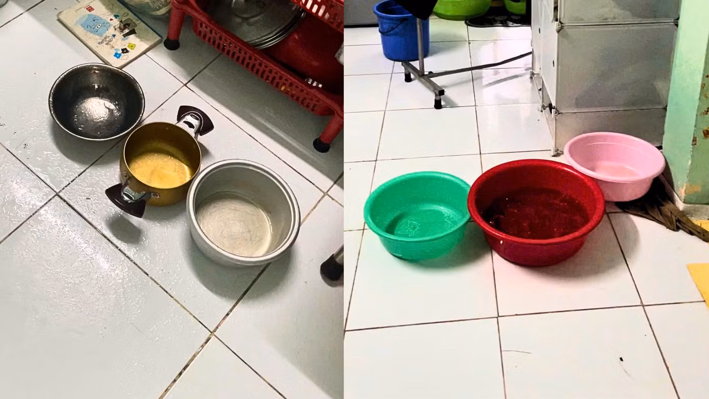 Hết thau chậu, sinh viên tận dụng cả tô chén, bình nước, nồi cơm điện để hứng mưa.