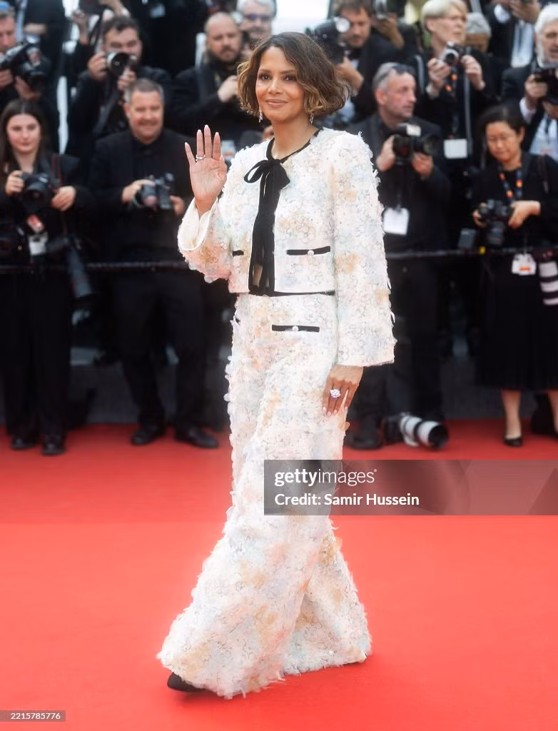 Nữ diễn viên Halle Berry, thành viên ban giám khảo LHP Cannes 2025, sánh đôi với chồng, ca sĩ Van Hunt. Ảnh: Getty Images.