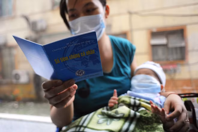 Dồn dập đưa trẻ đi tiêm phòng sởi miễn phí ảnh 9