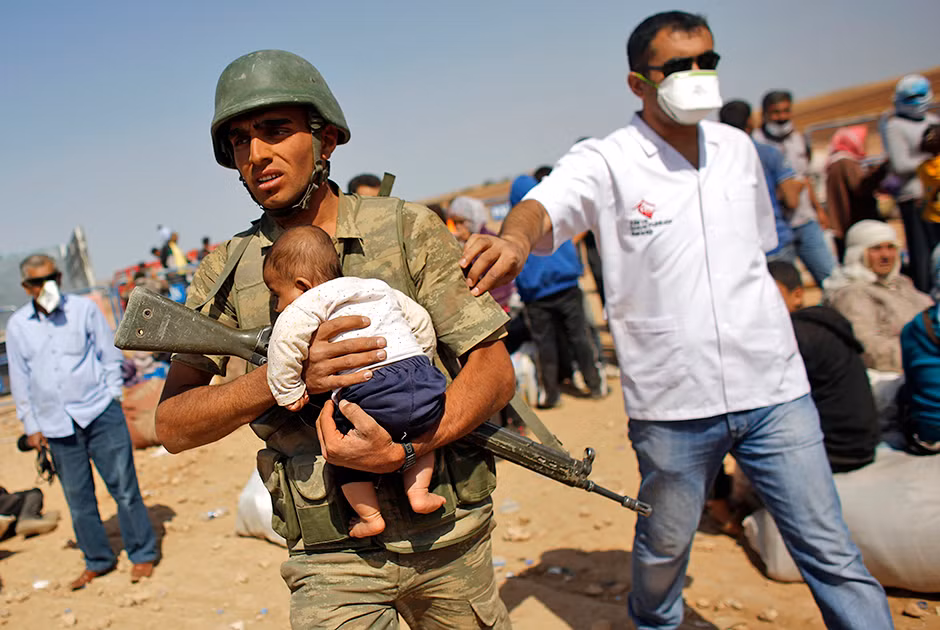 Khói đạn mịt mù gần biên giới Syria - Thổ Nhĩ Kỳ ảnh 13