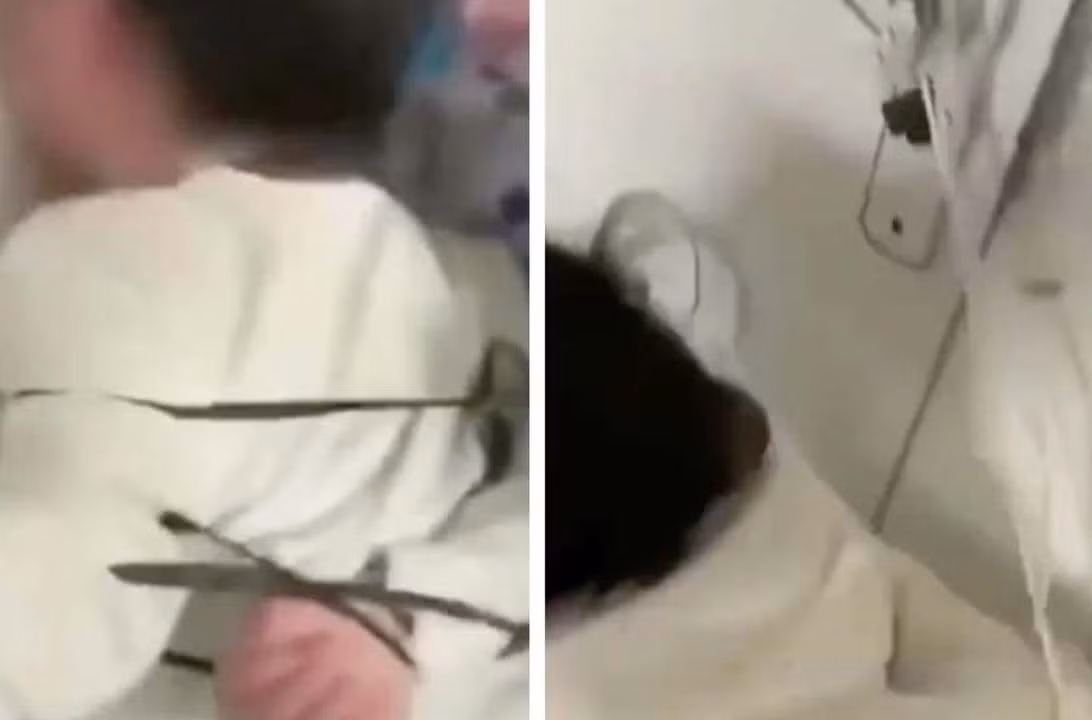 Hình ảnh hai đứa trẻ bị trói tay sau lưng trong video được đưa lên mạng xã hội Hình ảnh hai đứa trẻ bị trói tay sau lưng trong video được đưa lên mạng xã hội