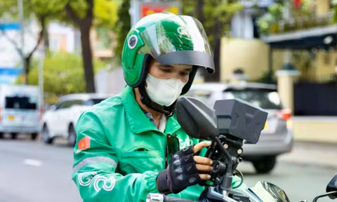 Lùm xùm phí Grab cao, cần siết lại ‘luật chơi’?