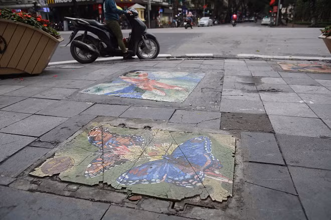 Bức tranh nghệ thuật trên nắp cống, hố ga ở Hà Nội ảnh 6