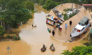 Lũ trên sông Lam dâng cao, quốc lộ hóa sông, người dân chèo thuyền sơ tán tài sản
