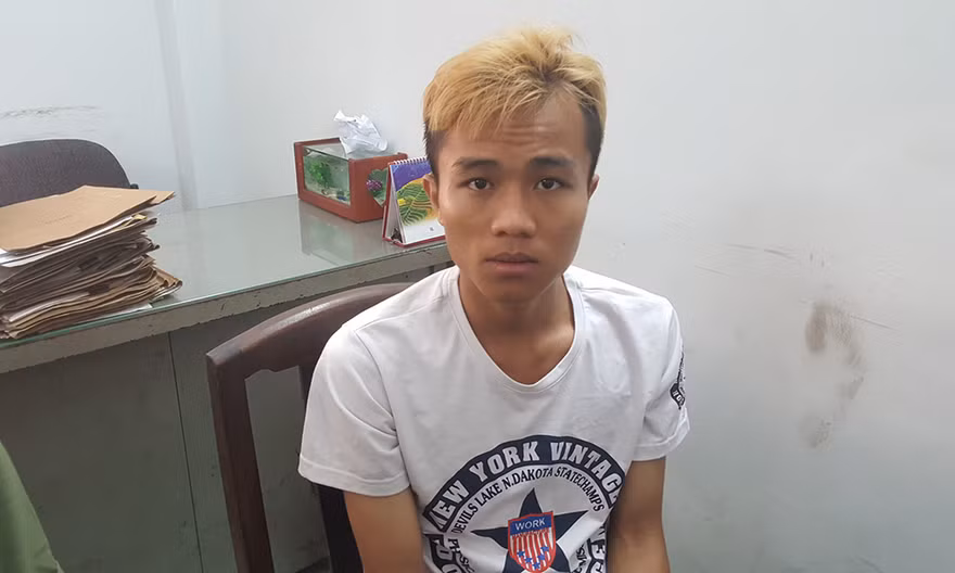Nghi can Lợi Chí Cường tại cơ quan điều tra. Ảnh CA.