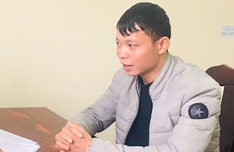 Quang tại cơ quan điều tra. Ảnh: Công an cung cấp.